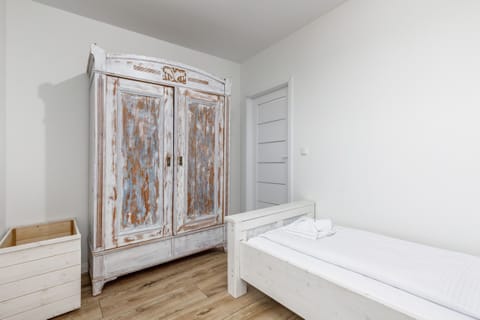 A spacious wardrobe provides ample storage for your belongings.