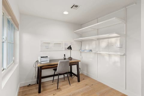 Office attached to Primary Bedroom offers privacy for getting some work done. Wireless printer included.