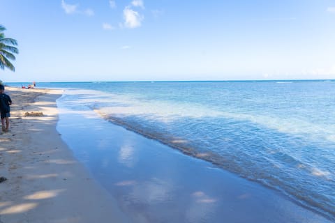 On the beach, sun loungers, beach towels