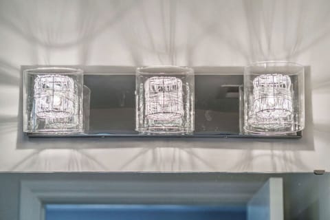 Wire wrapped vanity light for added beauty to our bathroom (2) 