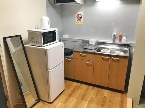 Fridge, microwave, stovetop, cookware/dishes/utensils