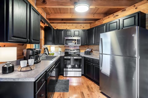 The kitchen is open to the dining area for convivial meal prep!