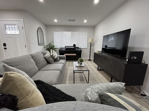 Comfort yourself with these soft and professionally cleaned sofas and Flat screen TV.