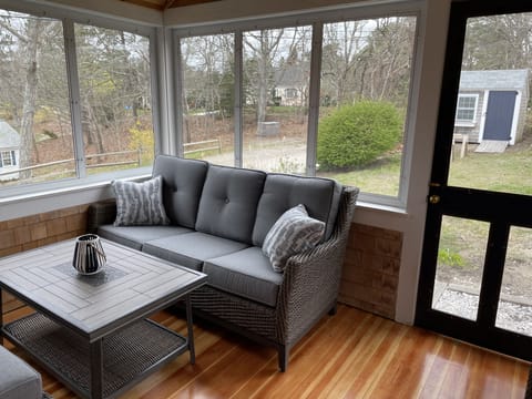 Large screened in porch area perfect for meals and conversation
