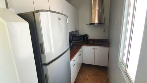 Fridge, microwave, coffee/tea maker, toaster