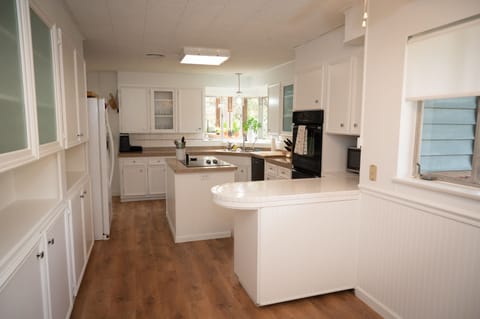 Large kitchen space and storage, everything you need for a big family meal!