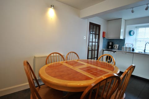 The spacious kitchen has room for dining