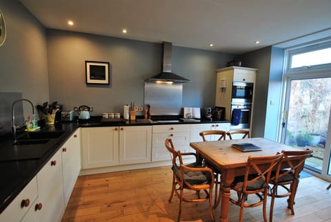 The modern kitchen spacious and well equipped