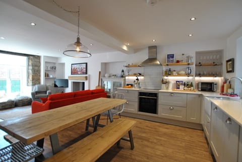 The dining kitchen is bright and light