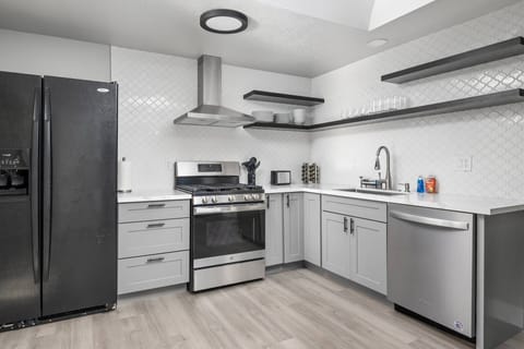 The kitchen is spacious and efficient. Perfect place to prepare a family meal.