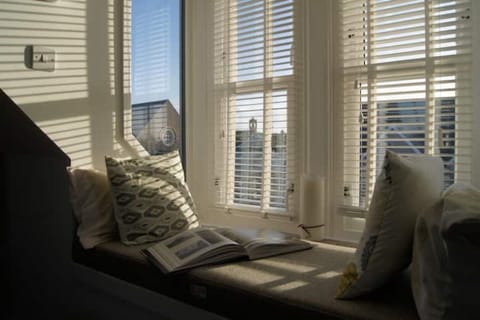 Enjoy a read in the window seat