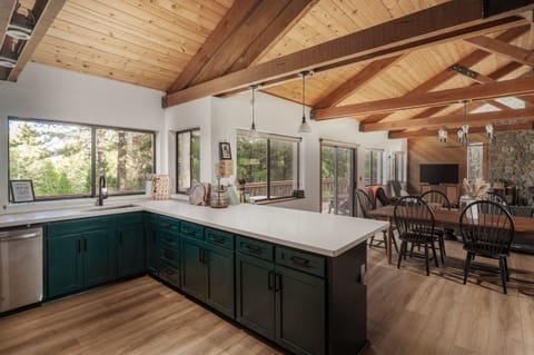 Kitchen open to dining and living room.