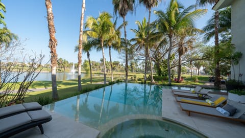 Outdoor pool, a heated pool, sun loungers