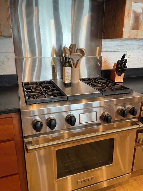 Gourmet, well-stocked kitchen.