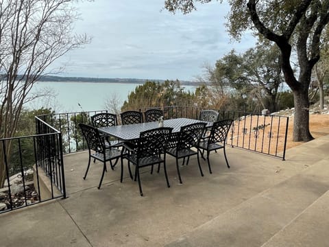 Multiple outdoor seating areas all with lake views.