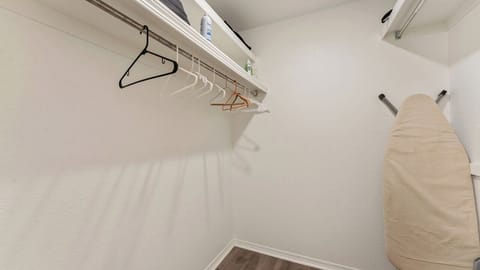 Walk in closet off master bedroom.