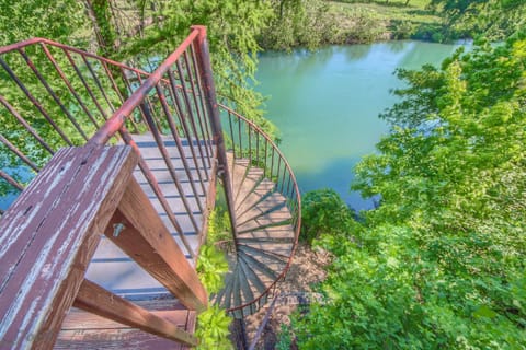 Spiral staircase leading down to the Guadalupe River