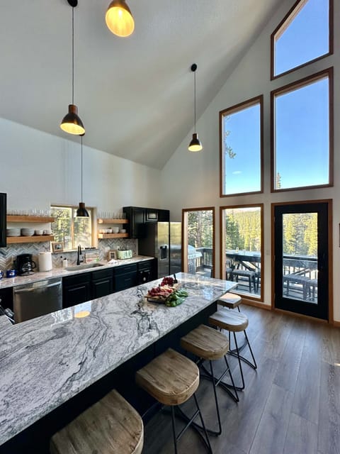 Floor to ceiling windows allow for epic outdoor viewing everywhere you stand inside of the home