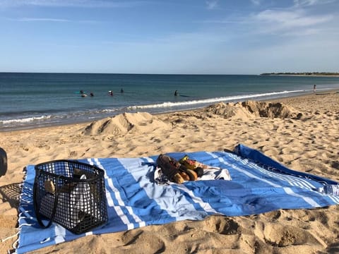 On the beach, sun loungers