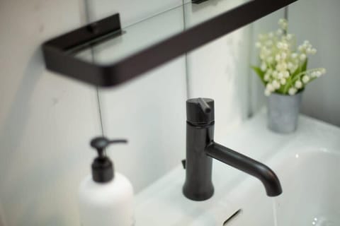 Bathtub, eco-friendly toiletries, hair dryer