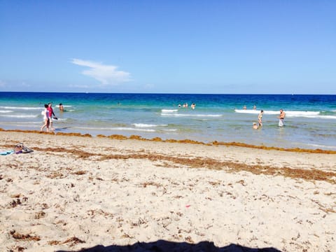 On the beach, sun loungers, beach towels