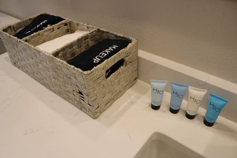 Shower, eco-friendly toiletries, hair dryer, towels