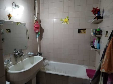 Combined shower/tub, hair dryer, towels, soap