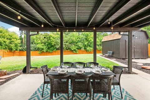Dine al fresco with the family on the covered patio