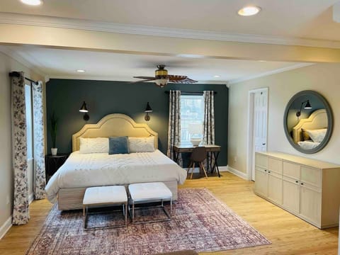 Enjoy this enormous master bedroom with king size bed, work desk, cozy loveseat with ottoman, corner fireplace and TV with Amazon Firestick.  Bring your log-in information to access your apps and watch your favorite shows. 