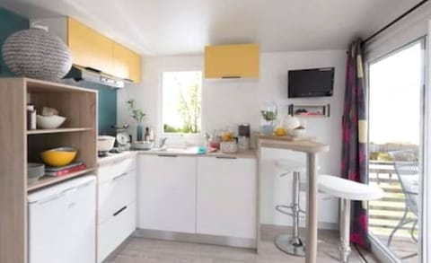 Prepare a meal in the equipped kitchen.