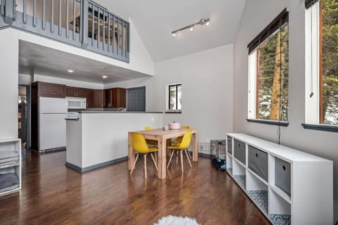 Open dining and kitchen with large windows