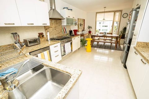 Enjoy home-cooked meals in our modern kitchen with stainless steel appliances