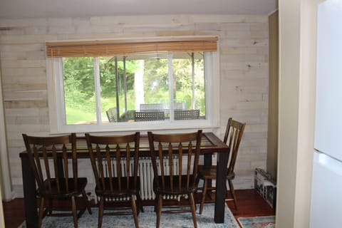 Newly renovated dining room.  More seating in sunroom.