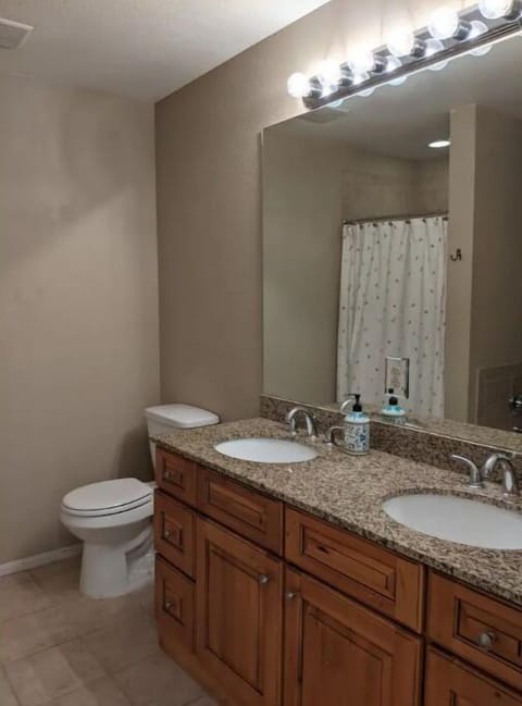 Double sink and large bathroom counter.