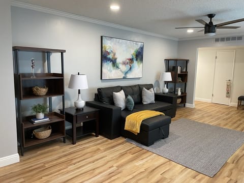 Living Room with Comcast TV, a Flex box, & Wi-Fi.