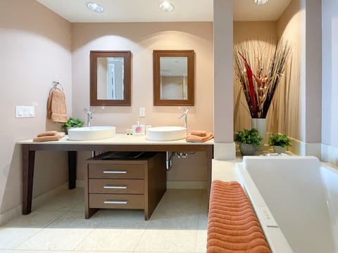 Bathtub, eco-friendly toiletries, hair dryer, towels