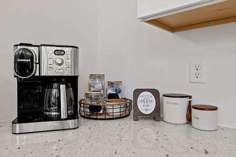 Cuisinart 2-in-1 coffee maker brews your favorite drip or pod coffee, hot or iced, in single cups or a carafe that serves up to 12. Complimentary: coffee, K-pods, tea, creamer, sugar, splenda provided.