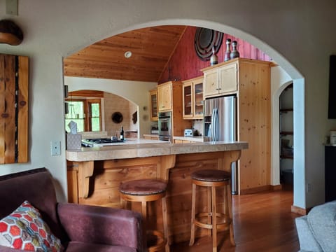 2 peninsulas on each end of the kitchen with 2 stools