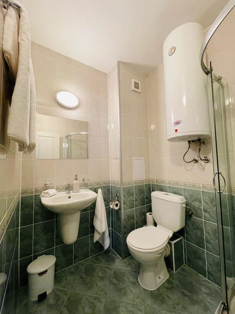 Combined shower/tub, hair dryer, towels, soap