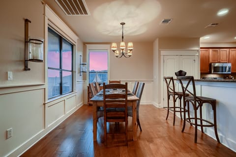 Dining table and bar stools for additional seating