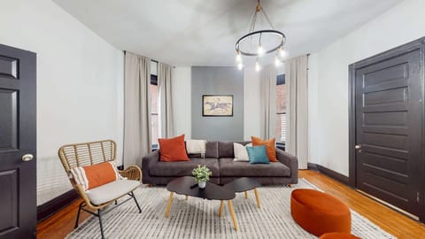 Living Room: In our living room there is a big comfy sofa for up to 4 people, an extra chair, a coffee table, and two small round chairs.