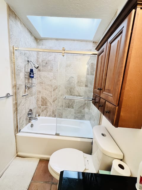 Combined shower/tub, hair dryer, towels, soap