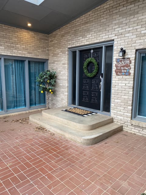 Large Front Entry Patio at with Grill and Seating