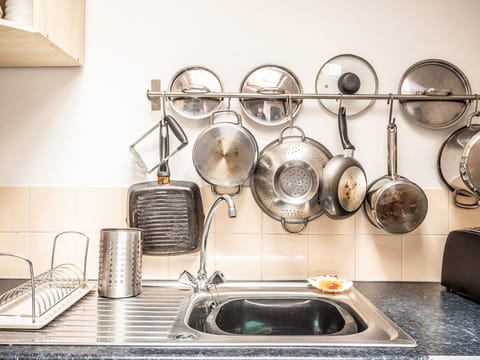 Fridge, oven, toaster, cookware/dishes/utensils