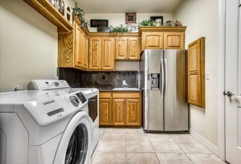Laundry Room with 2nd Refrigerator