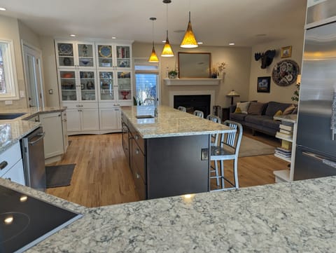 Cozy seating off the kitchen is perfect for conversation while cooking.