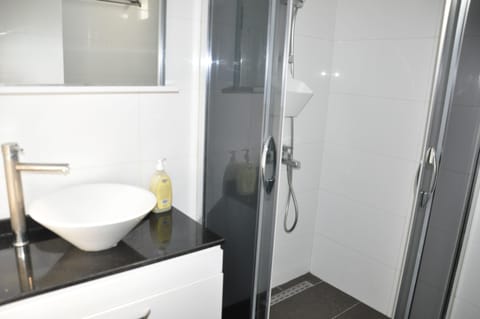 Combined shower/tub, hair dryer, towels, soap