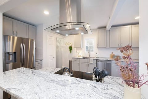 Cook in style with stainless steel appliances, granite countertops, and a spacious layout. The breakfast bar is perfect for coffee chats or casual dining.