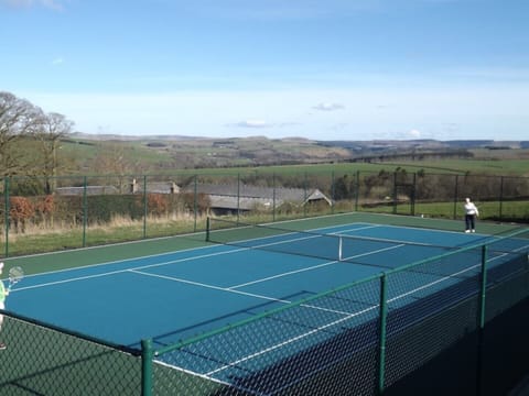 Book a slot on our tennis court - just bring your trainers, rackets and balls