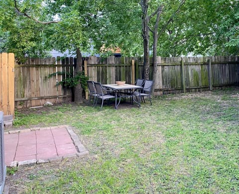 Private fenced-in backyard